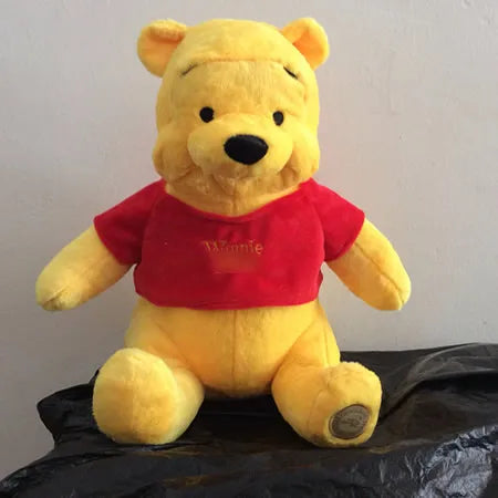 winnie-l'ourson-en-peluche
