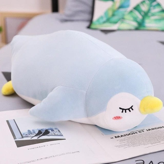 peluche-pingouin-endormie