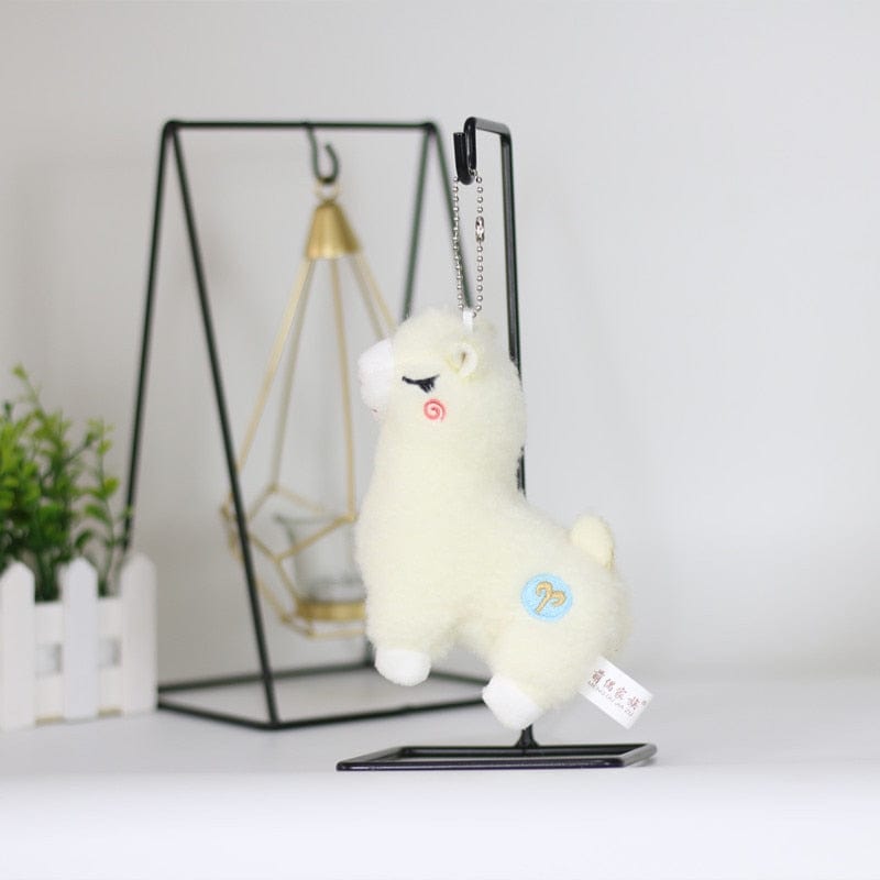 Peluche lama jaune à motif de papillon - Univers Peluche Peluche lama jaune à motif de papillon - Univers Peluche
