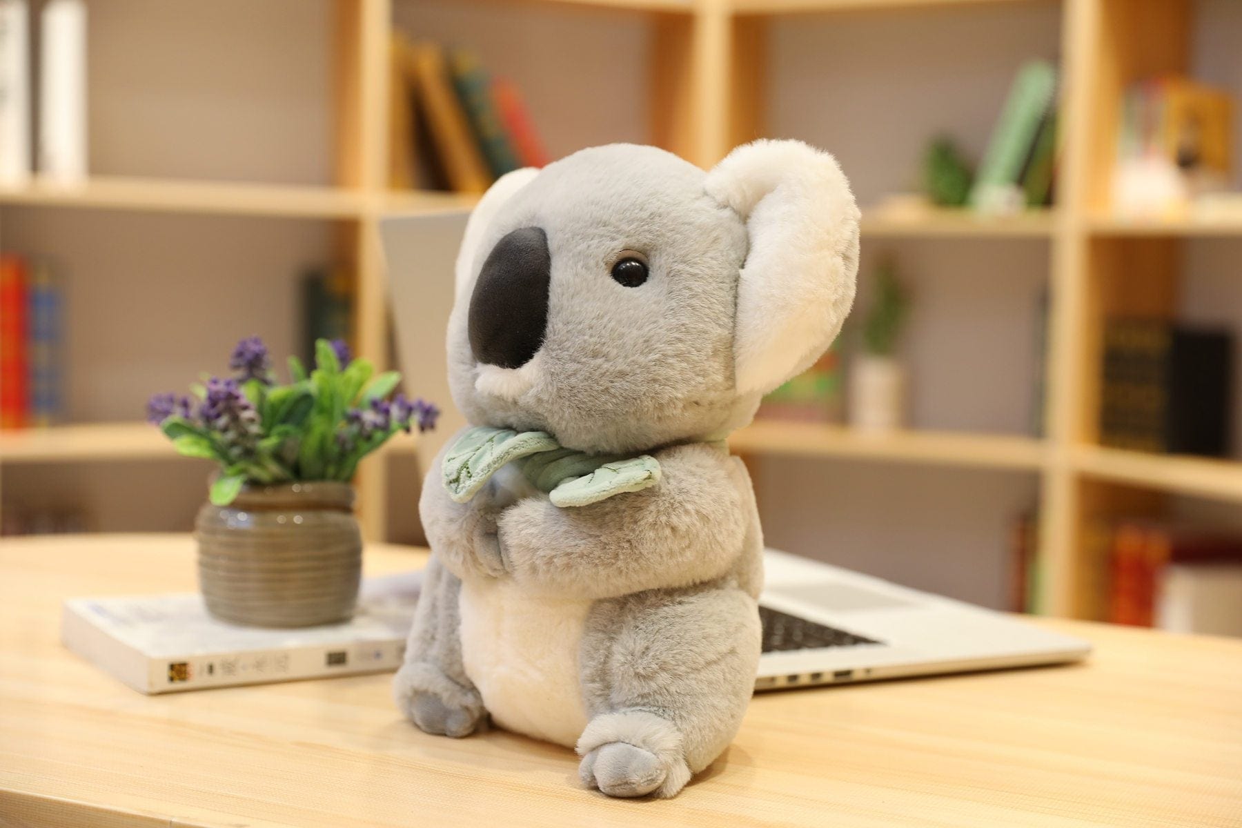 Peluche koala store avec bambou